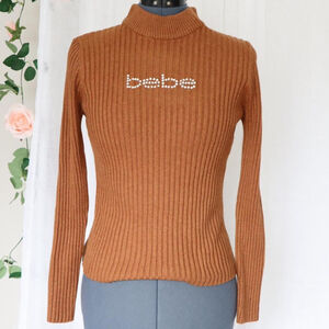 Brown Bebe rhinestone logo mockneck sweater
